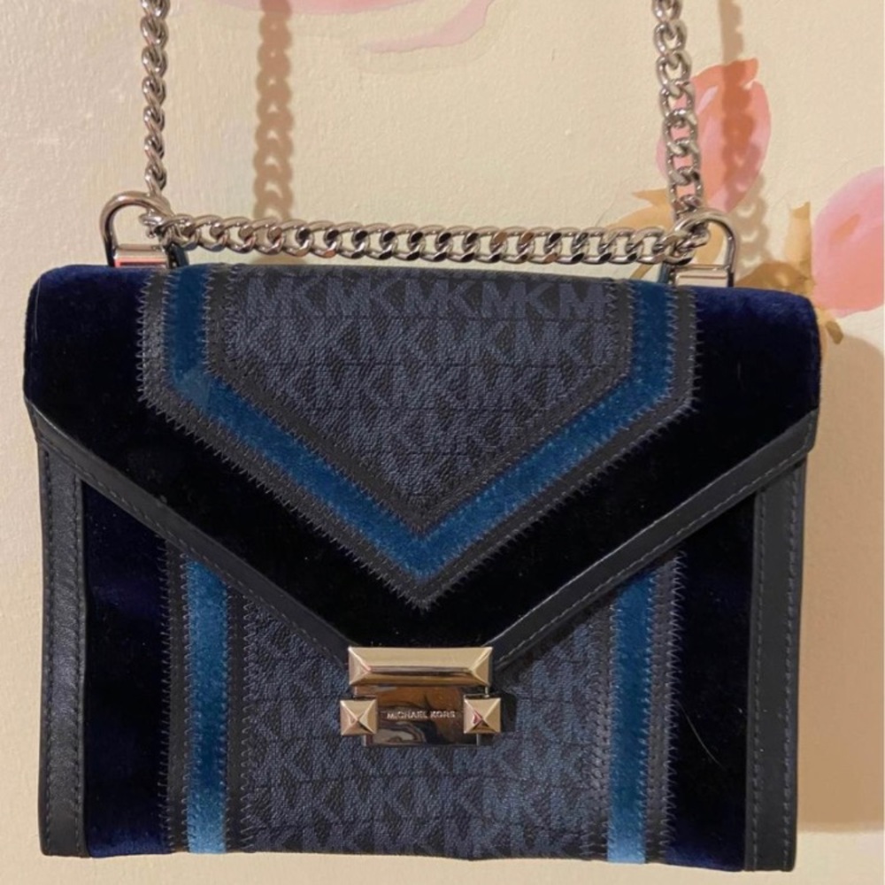 Michael Kors blue crossbody bag.
